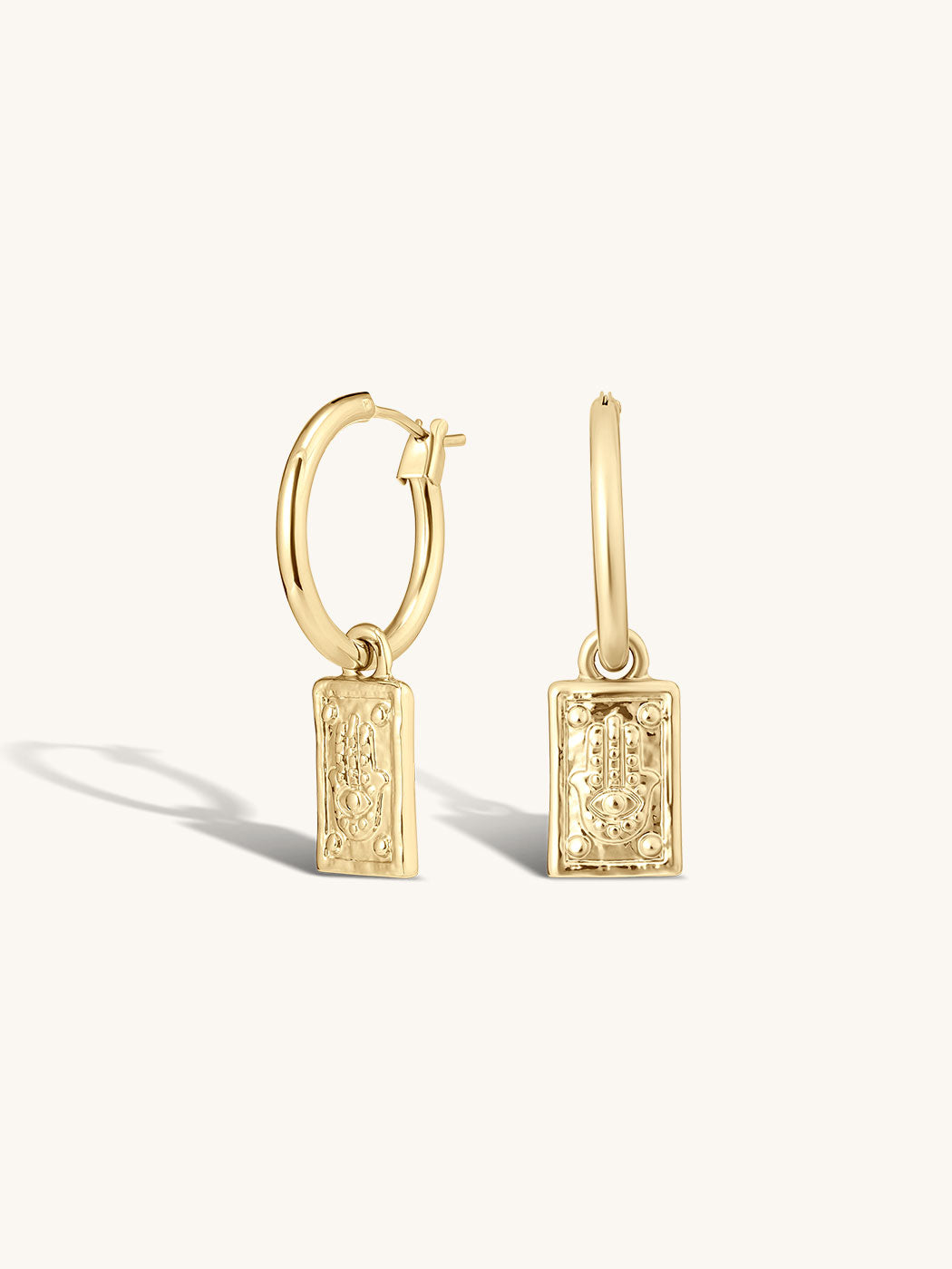 hamsa hand meaningful symbology hoops in gold