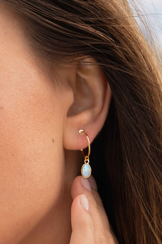opal-stone-minimal-boho-gold-hoops-on-body-closeup