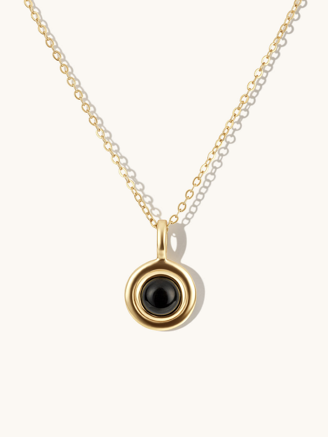 DOMED BLACK AGATE PENDANT ON SIMPLE CHAIN IN GOLD
