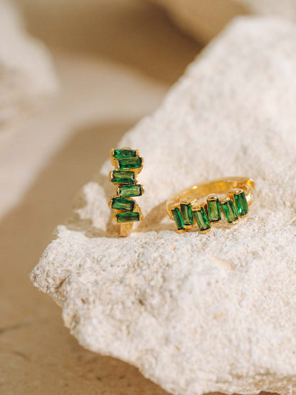 emerald block huggies on textured rock