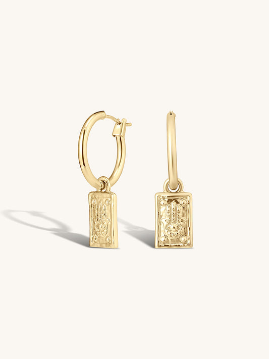 hamsa hand meaningful symbology hoops in gold