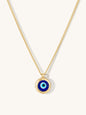 Necklace with a blue evil eye pendant on a white background