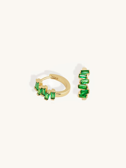 geometric emerald gemstones on gold base huggie