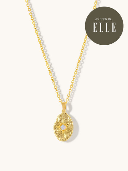gold textured necklace with opal gemstone