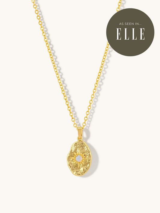 gold textured necklace with opal gemstone