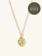 gold textured necklace with opal gemstone