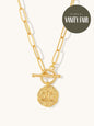 gold t bar necklace with celestial pendant
