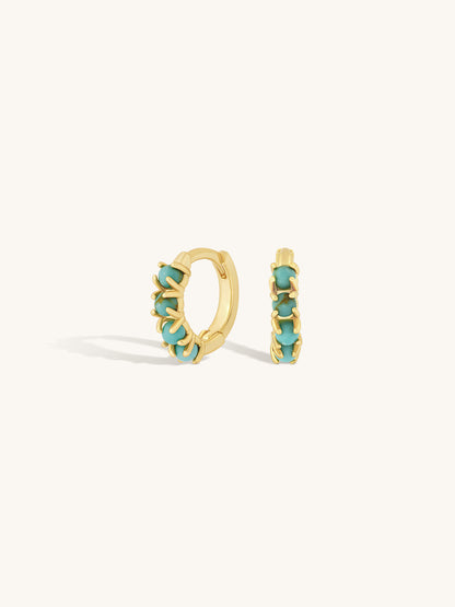 multi turquoise row of stones on gold huggie